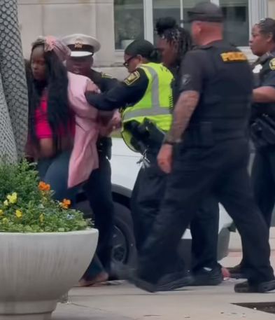 Lady arrested at the taste by 10 cops